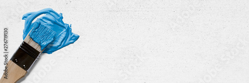 Cuadros en Lienzo brush with paint stroke on white wall background