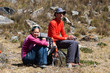 © makasana photo - mountain climber couple enjoy a break and taking photos in the Cordillera Blanca in the Andes of Peru