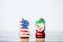 USA Flag And Iran Flag Print Screen On Horse Chess With White Background.It Is Symbol Of United State Of America And Iran Have Conflict In Nuclear Weapons And Strait Of Hormuz.