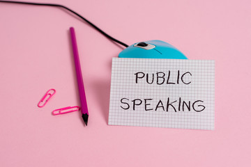 Word writing text Public Speaking. Business photo showcasing talking showing stage in subject Conference Presentation Wire vintage mouse clips marker squared paper sheet colored background