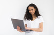 © F8  \ Suport Ukraine - Thoughtful young woman using laptop on white background