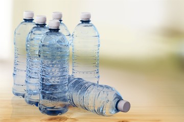 Canvas Print - Plastic bottles of water isolated on background