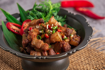 Wall Mural - Fried Crispy Pork Belly Cooked with Garlic and Pepper Sauce