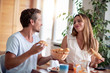 © ivanko80 - Couple having breakfast at home