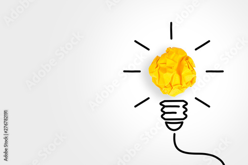 Fotografía New Idea Concepts Light Bulb with Crumpled Paper on White Background