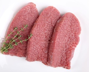 Beef sirloin steaks.