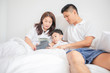 © tuiphotoengineer - family and son watching and  play tablet on bed