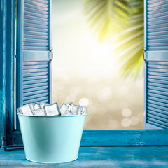 Wall Mural - Ice cubes in metal containe and summer window sill background of free space for your decoration. 