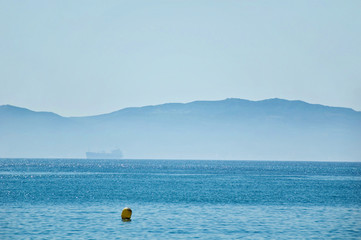 Beautiful view on strait of Gibraltar with fog