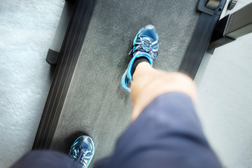 Running on treadmill looking down