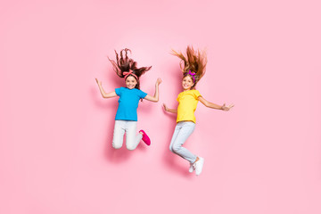 Sticker - Full size photo of cheerful kids have free time summer travel wear t-shirt headbands trousers pants isolated over pink background