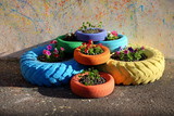 Fototapeta Morze - flowerbed of car tires
