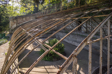 Poster - old broken down glass house in botanical garden