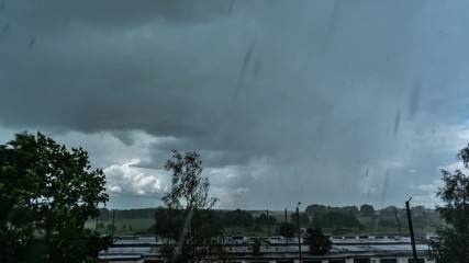 Wall Mural - Timelapse clouds over the green field. Stormy weather timelapse footage.