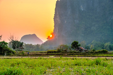 Wall Mural - Beautiful landscape in sunset, Vang Vieng