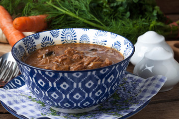 Canvas Print - Goulash soup with pork and mushrooms.