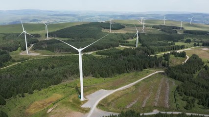 Wall Mural - Large wind turbines at an onshore windfarm on a Welsh hillside