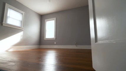 Empty Bedroom Door Opens Move Forward. view moves forward from a closed door that opens to reveal an empty bedroom through the doorway