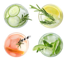 Set Of Glasses With Different Refreshing Drinks On White Background, Top View