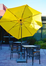 Yellow Parasol With Furniture