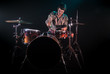 © puhimec - musician playing drums, black background and beautiful soft light