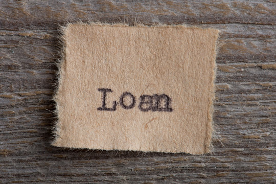 Loan typed text on a paper, real estate concept