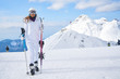 © ZoomTeam - Young caucasian woman skier . Winter sports and leasure activities