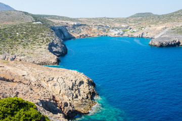 Wall Mural - Panorama of the bay of Antikythera with deep blue sea waters where the port of the islan is located in Potamos village, Greece