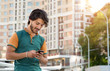 © A Stock Studio - Young man with a smartphone in his hands. Reads messages on social networks.