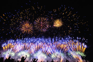 Real Fireworks footage 4k video on Deep Black Background Sky on Futuristic Fireworks festival show before independence day on 4 of July