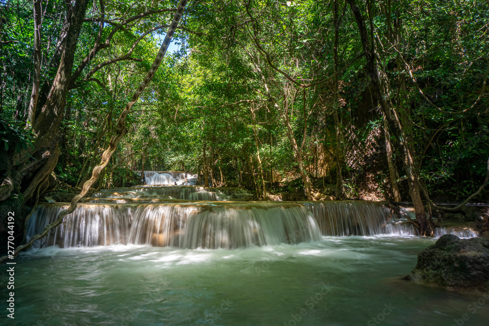 The clean waterfall there is an emerald green colour caused by ...