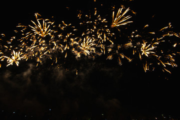 Real Fireworks footage 4k video on Deep Black Background Sky on Futuristic Fireworks festival show before independence day on 4 of July