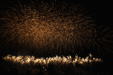 Real Fireworks footage 4k video on Deep Black Background Sky on Futuristic Fireworks festival show before independence day on 4 of July