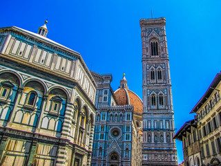 Florence Baptistery (Italian: Battistero di San Giovanni) with the Santa Maria del Fiore Cathedral in the background. In Florence, Italy