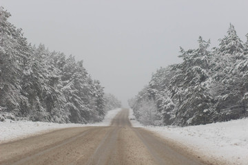 Wall Mural - Busy road in winter evening