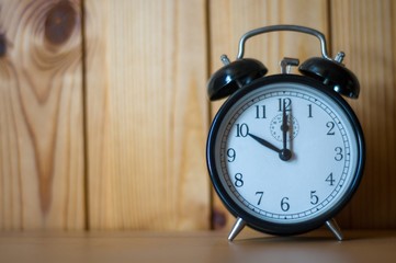 old alarm clock on the table