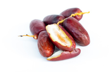 Wall Mural - Delicious fresh organic dates on white paper background