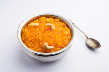 Sabudana or Sago Kesari dessert for Vrat Upvas also known as Sweetened Tapioca Pearl. served in a bowl. selective focus