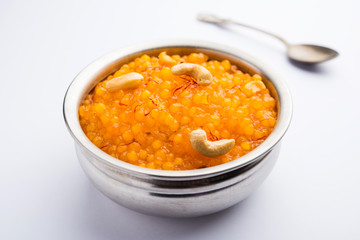 Sabudana or Sago Kesari dessert for Vrat Upvas also known as Sweetened Tapioca Pearl. served in a bowl. selective focus