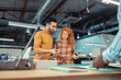 © zinkevych - Bearded man cooperating with red-haired graphic designer