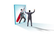 © Elnur - Businessman seeing himself in mirror as superhero