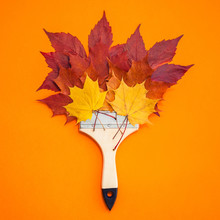 Paint Brush With Dry Bright Autumn Leaves Concept