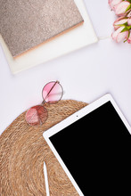 Feminin Blogger Holiday Flatlay Topview With Pink Flowers Sunglasses Ipad Basket Background Golden Notebooks