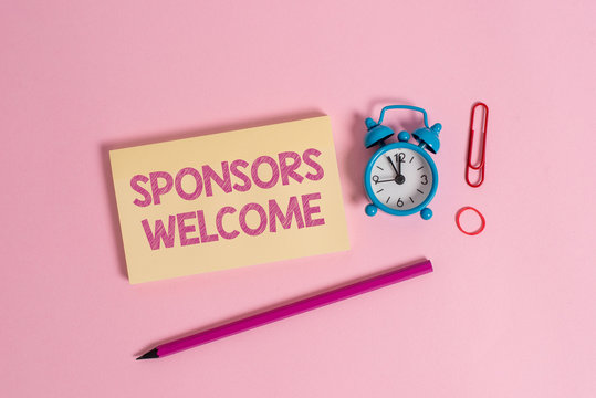 Word writing text Sponsors Welcome. Business photo showcasing announcing that you accept investing in your company Colorful blank notepad marker retro alarm clock clip colored background