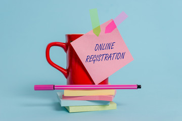 Fototapete - Word writing text Online Registration. Business photo showcasing System for subscribing or registering via the Internet Cup sticky note arrow banners stacked pads pen lying pastel background