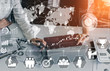 © InfiniteFlow - Achievement and Business Goal Success Concept - Creative business people with icon graphic interface showing employee reward giving for business success achievement.