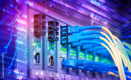 Cuadros en Lienzo Fiber Optic cables connected to optic ports and UTP, Network cables connected to ethernet ports