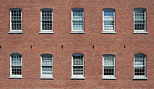 Facade View Of Brick Wall And Window Of Old Factory Building