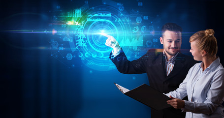Poster - Man and woman touching hologram screen displaying medical symbols and charts