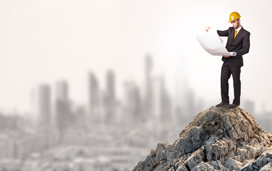 Young business person looking to the city from distance